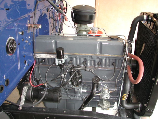 09_54SubEngineRight The ground cable from the head to the firewall is recommended with a radio installed.  The heater hoses are not yet plumbed.