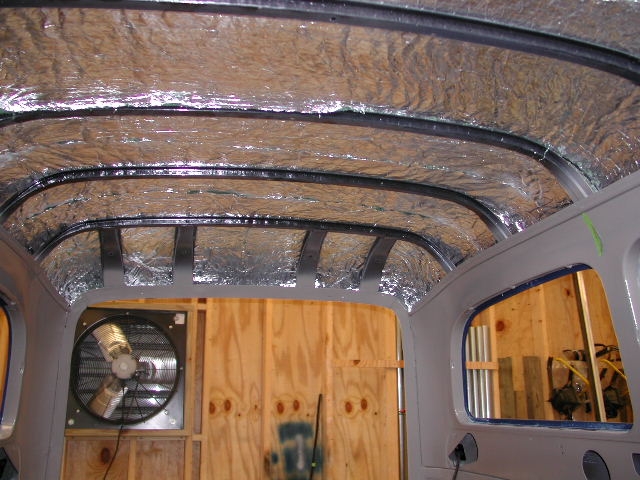 15_ceilinsul2 The insulation was attached with spray adhesive and the pieces were joined above the support strips.