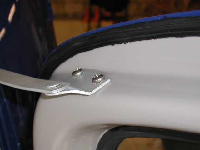 18_RearStop3 The rear-door seals from Jim Carter were the wrong shape and thus installation was messy and the appearance is ugly.  These will be replaced someday (Steele Rubber has seals with the correct profile).