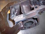 After the broken piece was tacked into place, Mike then successively cleaned the previous wweld/welds, grooved a little further into new territory, and then welded.  This was done repeatedly, until the weld progressed beyond the broken mating area.