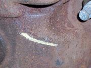 There is also a small crack on the other side of the heater box,  The crack trails up to the left, and the extent of the crack is marked in the next photo.